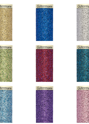 A collection of Gutermann metallic effect sewing thread in various colors displayed in individual reels.