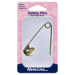 Pack of safety pins with a pink and white label, featuring the brand 'Hemline'.