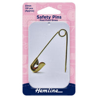 Pack of safety pins with a pink and white label, featuring the brand 'Hemline'.