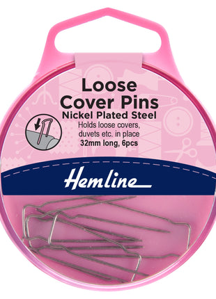 Pink packaging of Hemline loose cover pins with product details on a white background