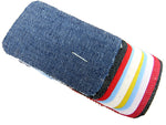 Ten iron on cotton patches on a white background