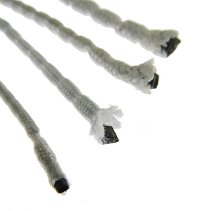 Close-up of multiple curtain lead weight tapes covered in white polyester tape on a white background