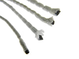 Close-up of multiple curtain lead weight tapes covered in white polyester tape on a white background