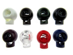 An array of cord locks in different colours on a white background