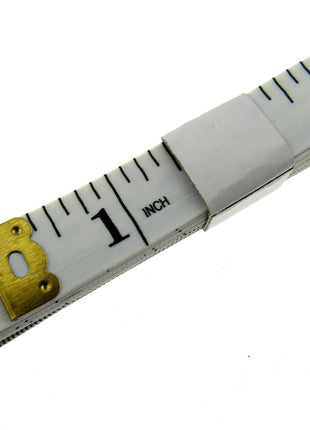 White measuring tape with black markings and gold measurement indicator on a white background