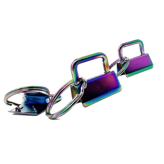 Three small rectangular padlocks with iridescent rainbow metal finishes, attached to matching metal rings and a split ring, shown on a plain white background.