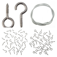 Collection of metal net curtain hooks, screws, and a net curtain wire on a white background