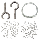 Collection of metal net curtain hooks, screws, and a net curtain wire on a white background