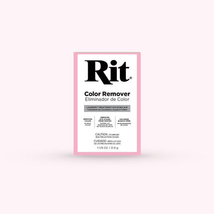 A single box of Rit Color Remover on a very pale pink background. The package is white with a pink border and large black Rit branding.