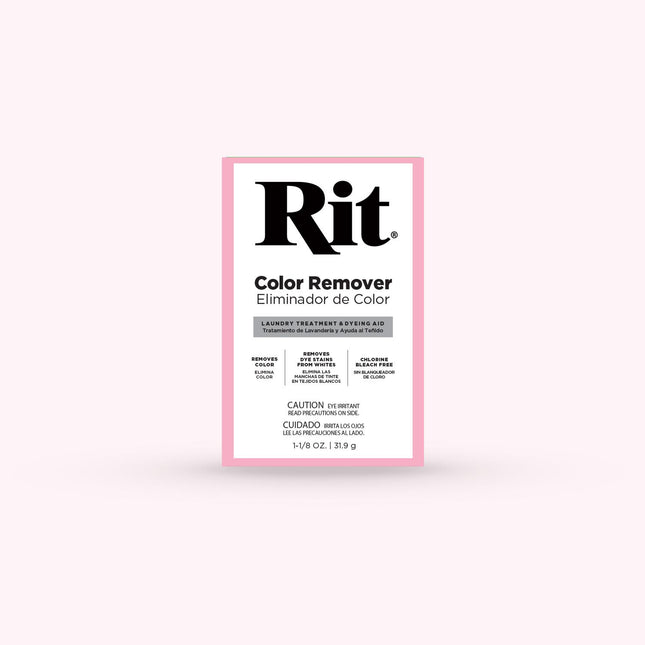A single box of Rit Color Remover on a very pale pink background. The package is white with a pink border and large black Rit branding.