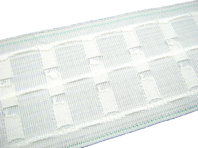 Close-up of a woven white premium curtain ape on a white background