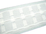 Close-up of a woven white premium curtain ape on a white background