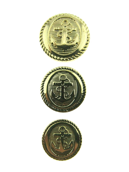 Three gold buttons with anchor design on a white background