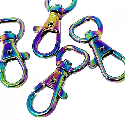 Four metallic lobster clasp keychains with an iridescent rainbow finish, arranged on a plain white background.