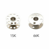 Two metal spools with sizes 15K and 66K on a white background