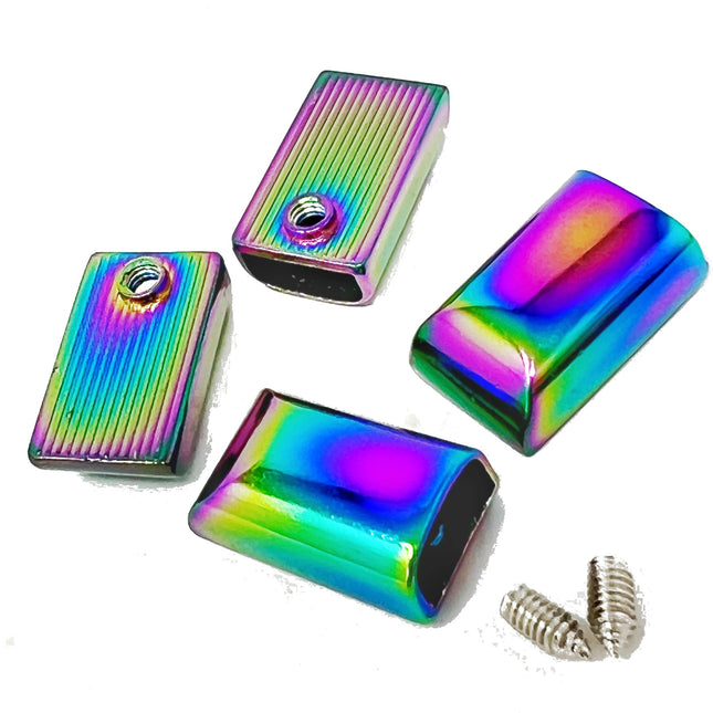 Four rectangular iridescent metal zip ends with a rainbow holographic finish, two ribbed and two smooth, shown with two silver screws on a white background.