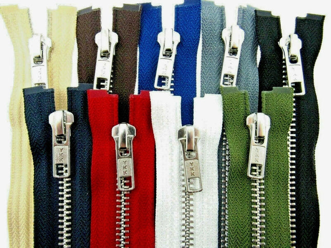 Genuine YKK number 5 metal open end separating zip fastener with polished silver teeth close up, Heavy duty silver teeth YKK jacket zipper tape width 30mm layout, Open end silver metal coat zip available in 9 colors and 17 lengths