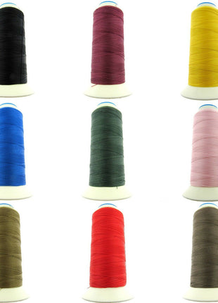 A collection of 15 spools of bonded nylon 40's sewing thread in various colors including beige, black, brown, gray, pink, red, white, and yellow.