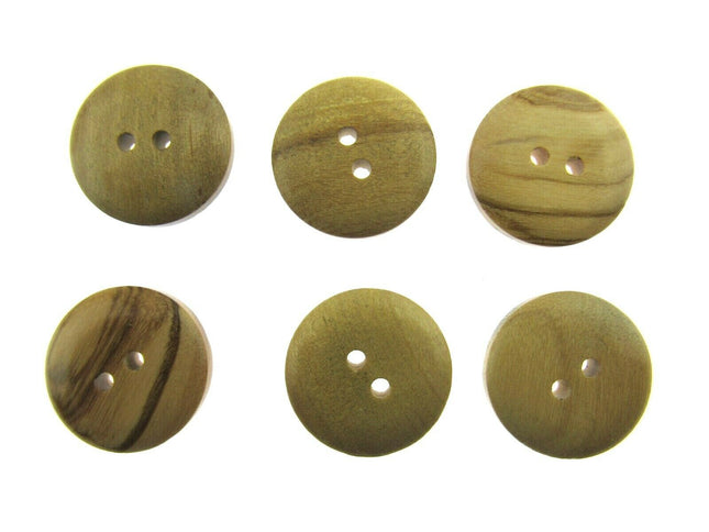Round wooden olive wood buttons with 2 holes on a white background