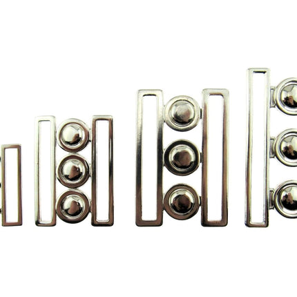 An array for silver nurses buckles on a white background in 4 different sizes