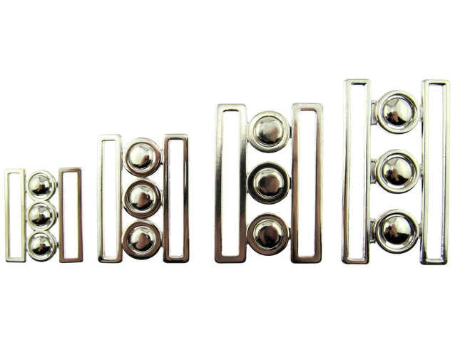 An array for silver nurses buckles on a white background in 4 different sizes