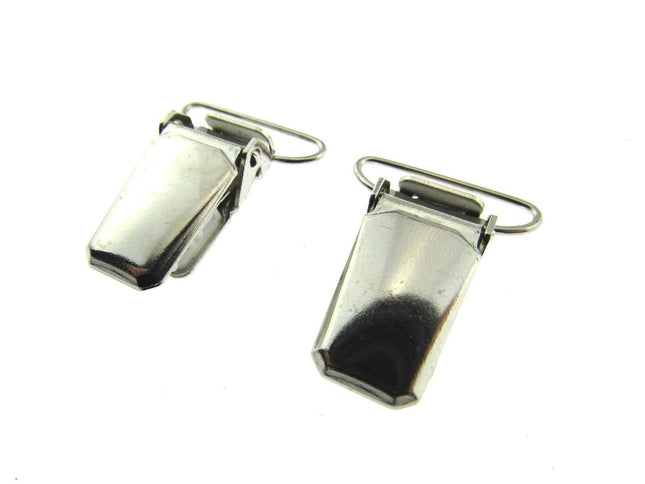 "Silver metal brace end clips 30mm x 15mm shown as a pair"