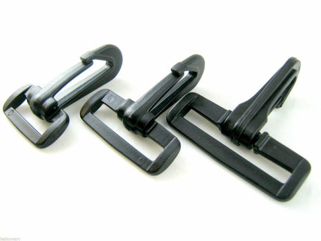 Three black plastic snap hooks of different sizes arranged in a row on a white background.