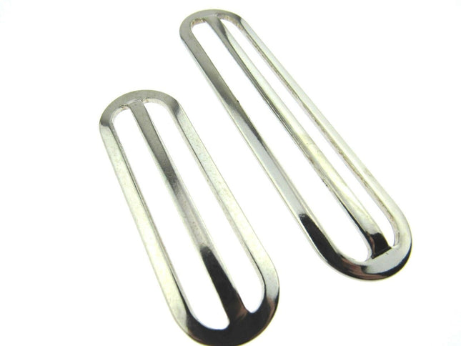 solid metal sliders on a white background