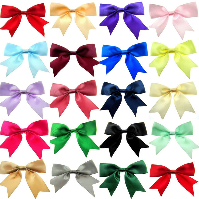 A collection of satin ribbon bows in various colors with tails approximately 4.5cm long.