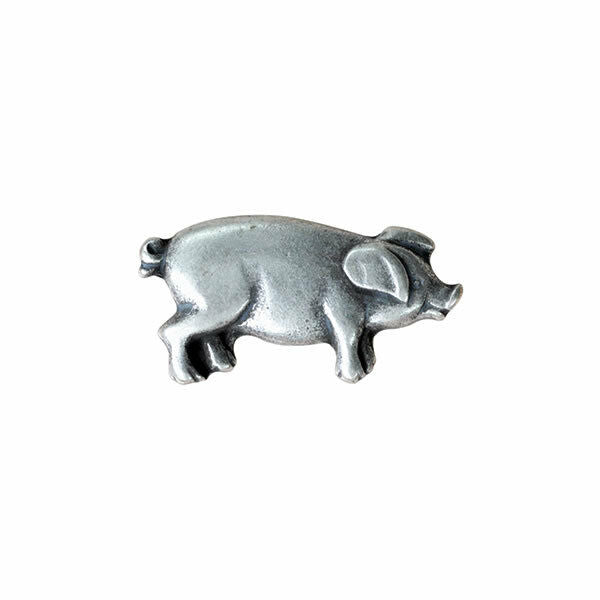 Antique silver metal button in the shape of a pig