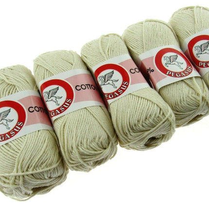 5 balls of ecru dish cloth cotton laying flat