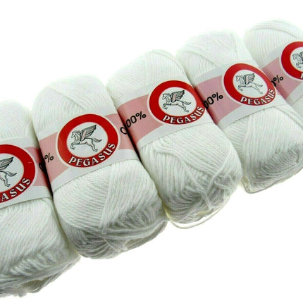 5 balls of white dish cloth cotton laying flat