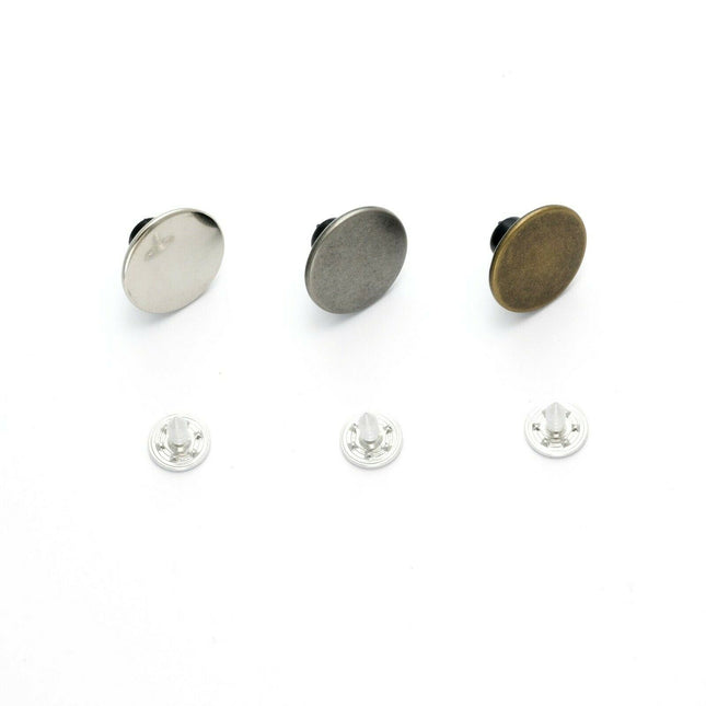 17mm no sew hammer home jean buttons in silver, gunmetal or antique brass sitting side by side in a row