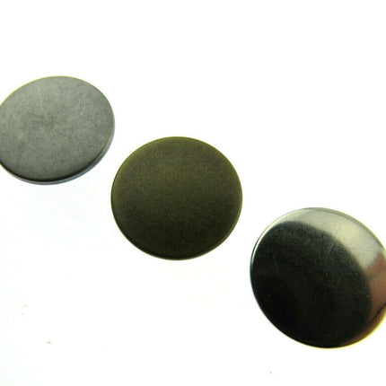 17mm no sew hammer home jean buttons in silver, gunmetal or antique brass sitting side by side in a left to right diagonal row