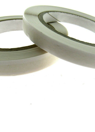 Easy lift double sided sticky tape 33m reels with extended paper backing for easy peeling, Acid free scrapbooking and card making tape rolls close up showing adhesive widths, Professional finger tear double sided craft tape available in 6mm and 8mm widths