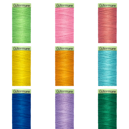 A collection of Gutermann Top Stitch 100% Polyester sewing thread reels in assorted colors.