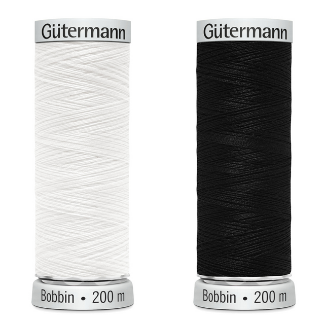 Two reels of Gutterman Sulky bobbin embroidery thread in black and white, each with 200 meters of thread.