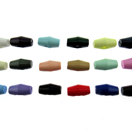 An array of plastic baby toggle buttons in various solid colors displayed in a grid pattern.