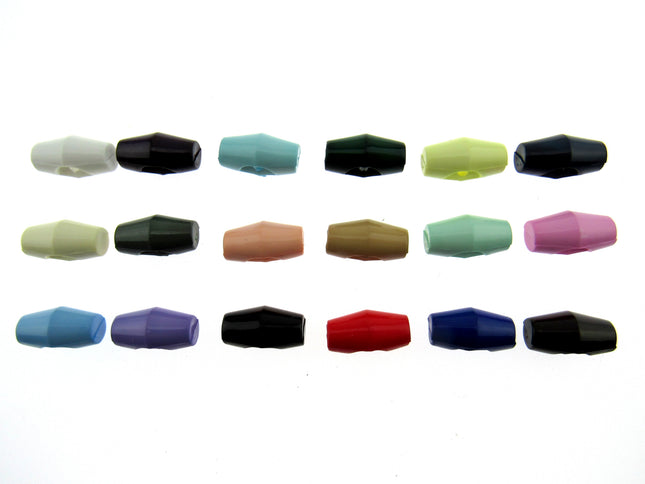 An array of plastic baby toggle buttons in various solid colors displayed in a grid pattern.