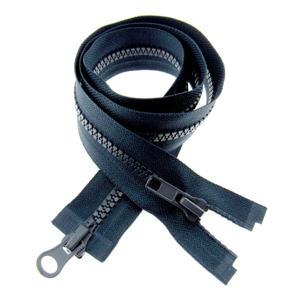 A set of four images showing a 2-way open end chunky plastic zip in black and navy colors, in various states of opening.