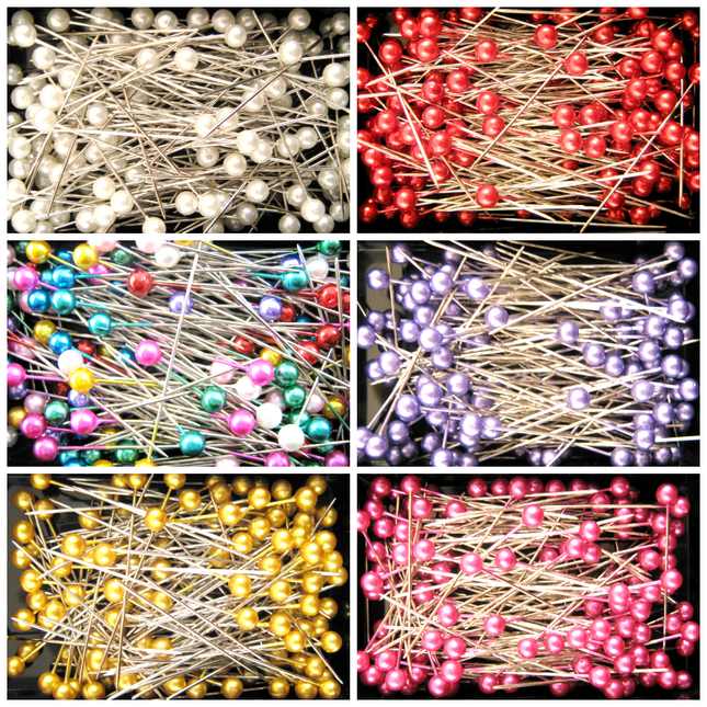 Boxes containing 40mm long pearl craft pins in various colors including white, red, blue, purple, yellow, and pink.