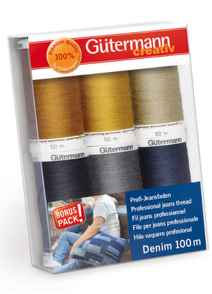 Packaging of Gutermann denim thread in various colors, with a label indicating a bonus pack of 100m denim thread.