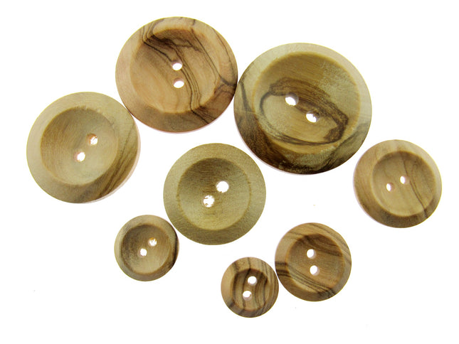 A collection of round wooden buttons with two holes and a wedge rim, varying in size, displayed on a white background.