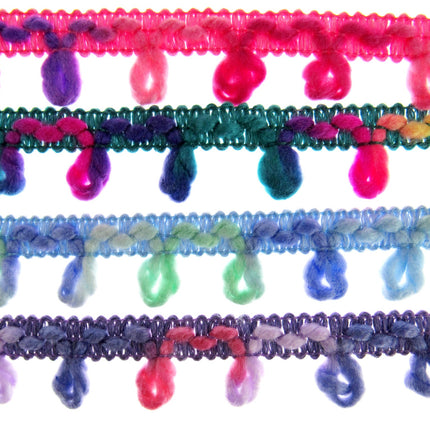 A series of woolen unicorn braided trims in various colors, arranged side by side.
