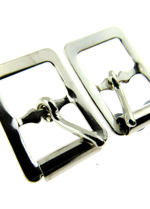 A pair of silver roller buckles suitable for shoes or belts