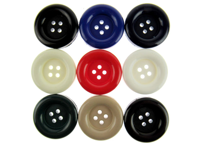 A set of round large ladies' coat buttons in various colors including black, blue, red, white, beige, green, and black again, arranged neatly in a grid pattern.