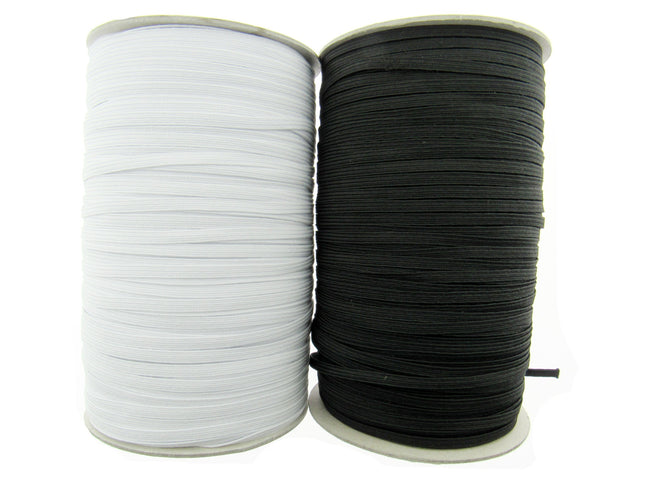 A roll of thin flat braid elastic in black and white colors, with a 7mm width and an 8 cord knicker.