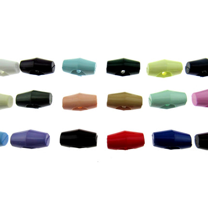 An array of plastic baby toggle buttons in various solid colors displayed in two rows.