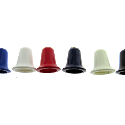 A selection of bell-shaped cord ends in various solid colors aligned in a row.