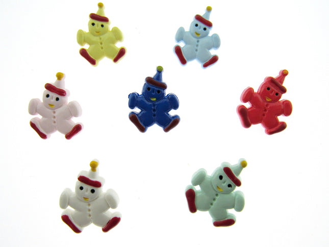 Hand painted plastic buttons in the shape of clowns in various colors including white, yellow, blue, pink, red, and green.